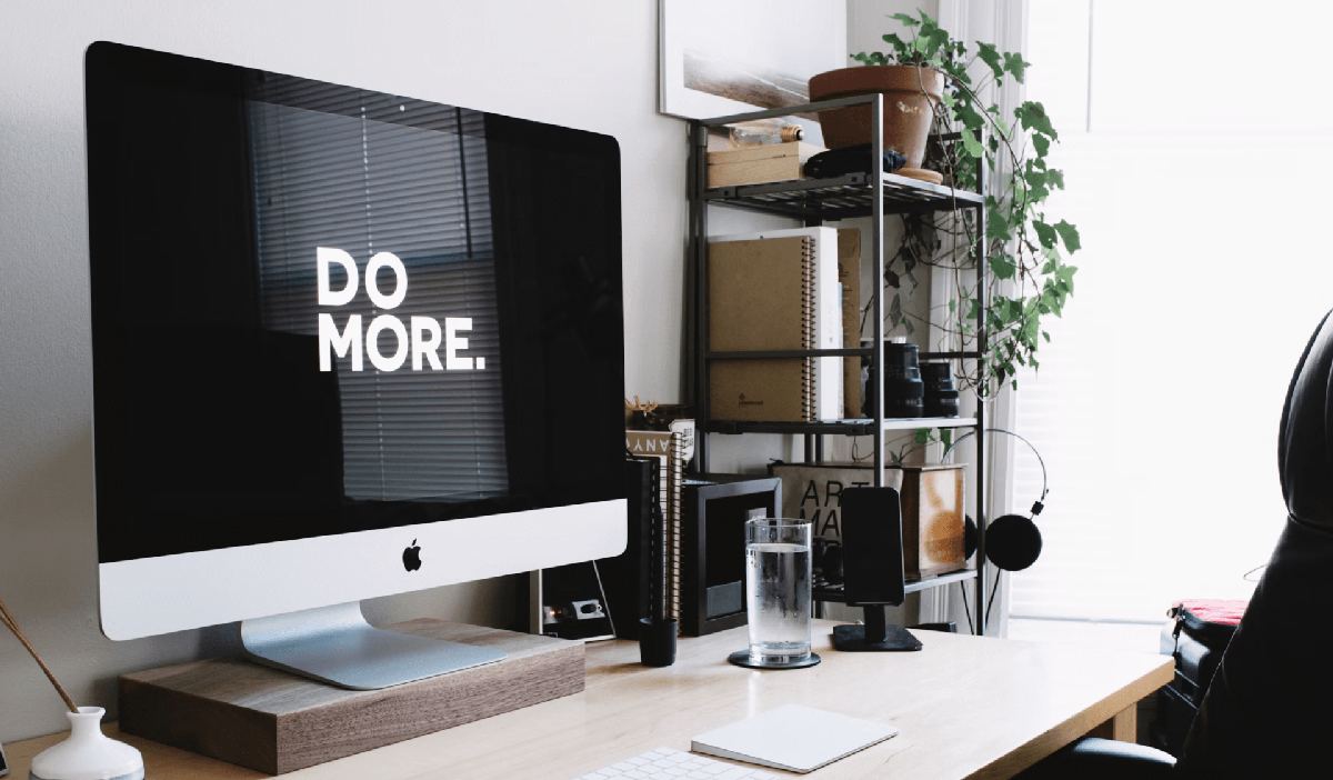 desk top with "do more" on screen