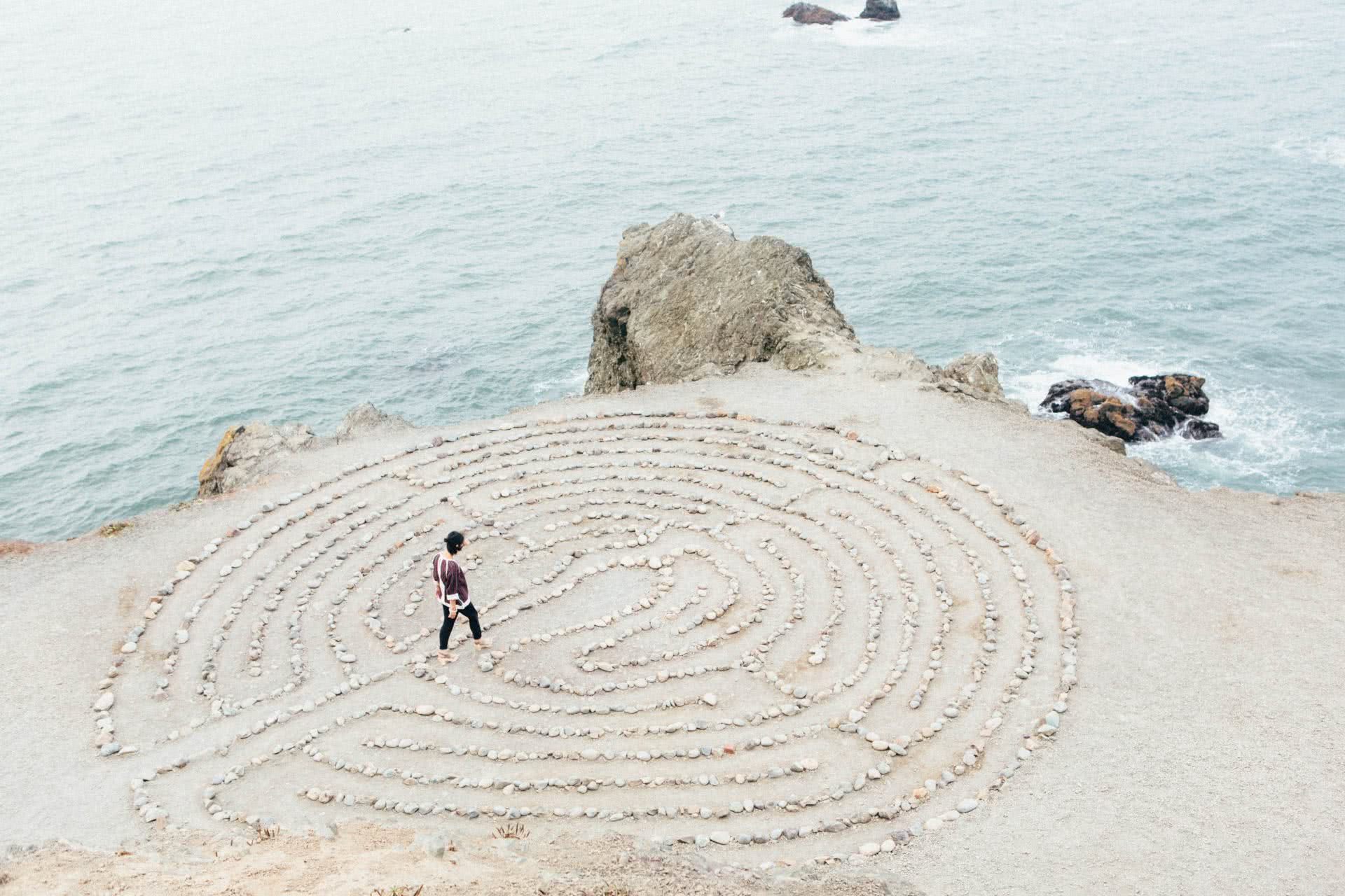 woman walking around maze