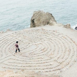 woman walking around maze