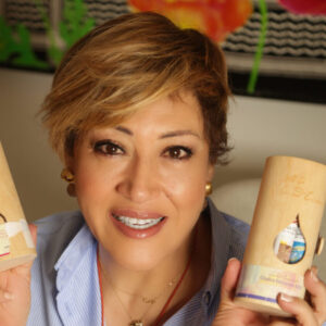 Sahar Huneidi Palmer holding Sound Essence Aura Sprays