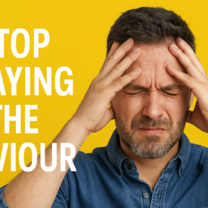 A man with short dark hair and beard pressing his hands to his forehead looking frustrated against a bright yellow background with text saying Stop Playing The Saviour.