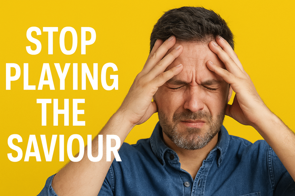 A man with short dark hair and beard pressing his hands to his forehead looking frustrated against a bright yellow background with text saying Stop Playing The Saviour.