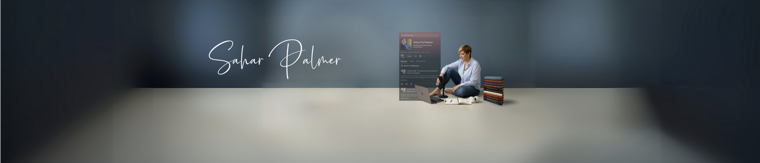 Sahar Palmer sitting cross-legged on the floor with a laptop, microphone, and a stack of her books beside her, representing Unbox The Podcast and her work as an intuitive life mentor, author, and podcaster.