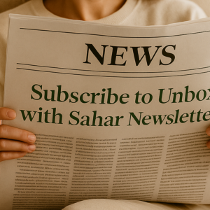 a woman sitting on a sofa holding a newspaper with the headline subscribe to Unbox with Sahar newsletter